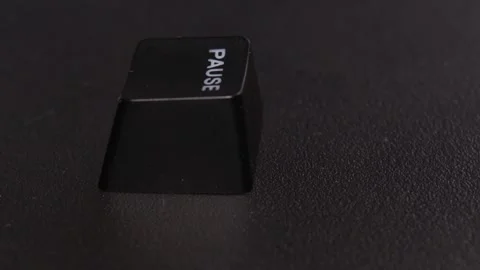 The thick black mechanical keyboard key black surface rotates 360 degrees Stock Footage 250977329
