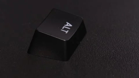 The thick black mechanical keyboard key black surface rotates 360 degrees Stock Footage 250977642
