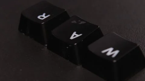 The thick black mechanical keyboard key black surface rotates 360 degrees Stock Footage 250978078