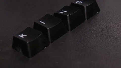 The thick black mechanical keyboard key black surface rotates 360 degrees Stock Footage 250978265