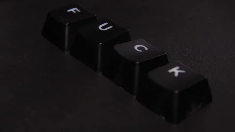 The thick black mechanical keyboard key black surface rotates 360 degrees Stock Footage 250979386