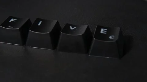 The thick black mechanical keyboard key black surface rotates 360 degrees Stock Footage 250982213