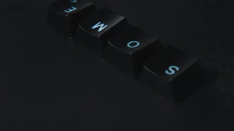 The thick black mechanical keyboard key black surface rotates 360 degrees Stock Footage 250982520