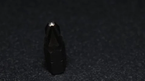 The thick black mechanical keyboard key connected to the blue switch on a black Stock Footage 253865801