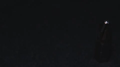 The thick black mechanical keyboard key connected to the blue switch on a black Stock Footage 253865972