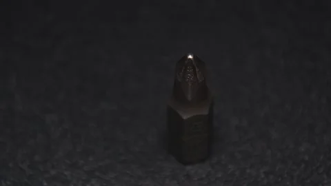 The thick black mechanical keyboard key connected to the blue switch on a black Stock Footage 253866393
