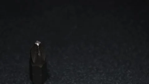 The thick black mechanical keyboard key connected to the blue switch on a black Stock Footage 253866965