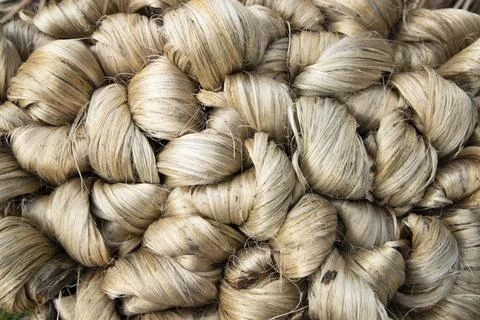 Thick brown bundle of raw jute fiber Texture Background Stock Photos
