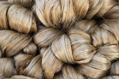 Thick brown bundle of raw jute fiber Texture Background Stock Photos