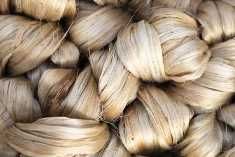 Thick brown bundle of raw jute fiber Texture Background Stock Photos