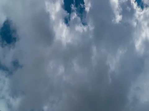 Thick cloud moving fast with bottom view in a windy afternoon. 動画素材 73014276