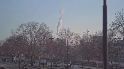 Thick cloud raising up to the sky from a factory complex in Paris, France. Stock Footage 104314922