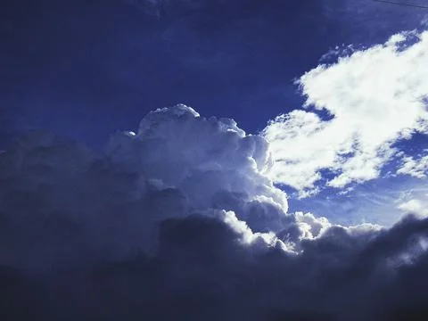Thick clouds against the blue sky Foto stock