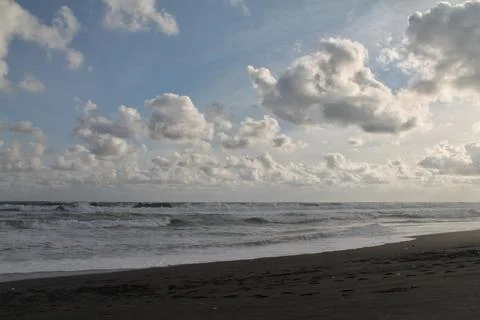 Thick clouds at the beach Stock Photos