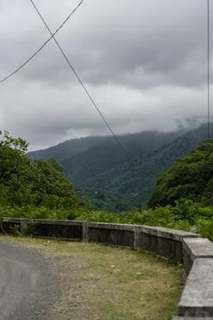 Thick clouds of cloudy sky over the mountains of Georgia Stock Photos