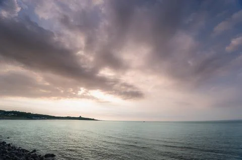 Thick Clouds Covering Sunset Over Shimen Coast in New Taipei Taiwan. Stock Photos