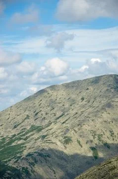 Thick clouds floating above the forest Stock Photos