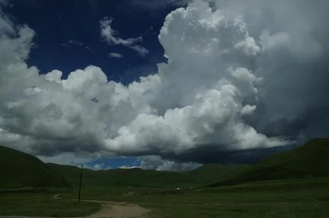 Thick clouds hung low and covered the sky Stock Photos