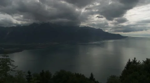 Thick clouds moving over a lake Stock Footage 41499746