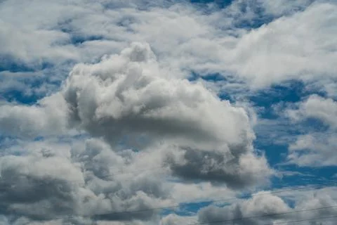 Thick clouds over the village Stock Photos