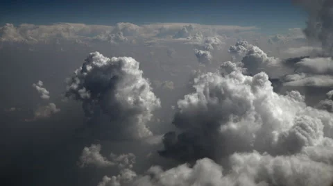 Thick clouds seen through the airplane window above the ground Stock Footage 69013324