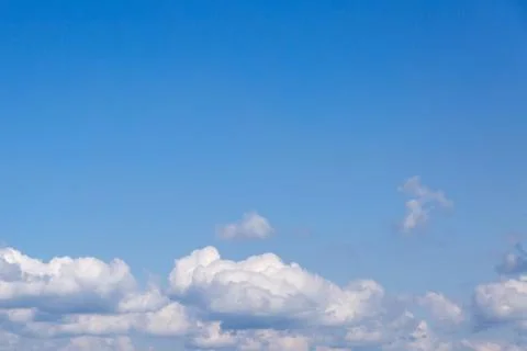 Thick clouds in the sky. Cloudy weather with clouds and clouds. On the sky cl Stock Photos