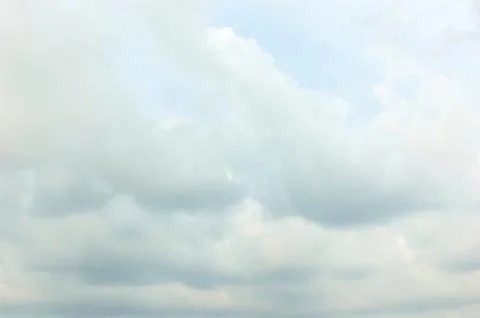 Thick clouds in summer blue sky. Cloudy bright beauty in the sun, bright an.. Stock Photos