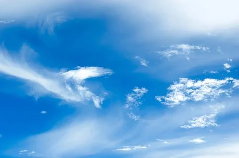 Thick clouds in summer blue sky. Cloudy bright beauty in the sun, bright an.. Stock Photos