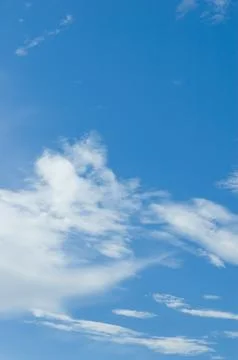 Thick clouds in summer blue sky. Cloudy bright beauty in the sun, bright an.. Stock Photos