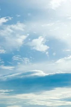 Thick clouds in summer blue sky. Cloudy bright beauty in the sun, bright an.. Stock Photos