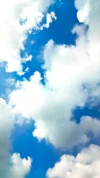 Thick clouds in summer blue sky. Cloudy bright beauty in the sun, bright an.. Stock Photos