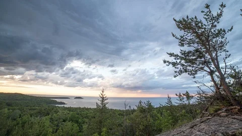 Thick clouds turning red Stock Footage 100138567