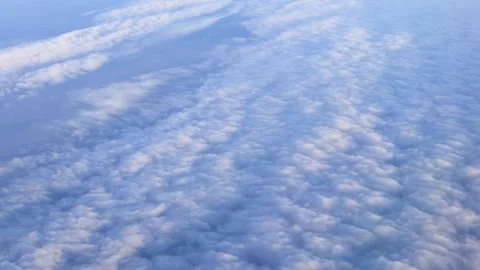 Thick clouds. View from the window of an airplane. Real time Stock Footage 258574066