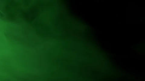 Thick Colored Smoke Drifting Slowly Across Black Background Changing Hues Vidéo 330115204