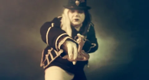 Thick crazy actor in white makeup with a snake. Masquerade. 動画素材 70986552