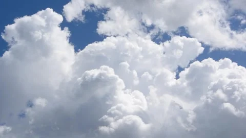 Thick Cumulus Clouds Cover the Blue Sky Stock Footage 248532386