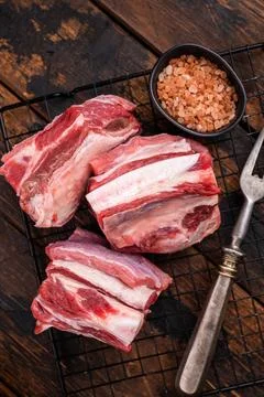 Thick Cut raw lamb Short Ribs, fresh mutton meat with bone. wooden backgrou.. Stock Photos