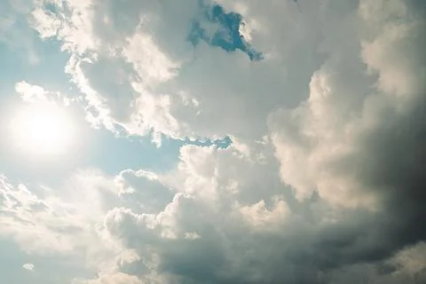 Thick dark clouds fill sky, showing signs of approaching storm. mix of gray a Stock Photos