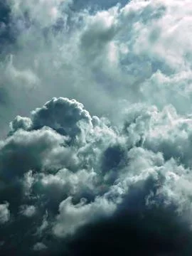 Thick dark clouds move quickly blown by the wind before heavy rain. Copy sp.. Stock Photos