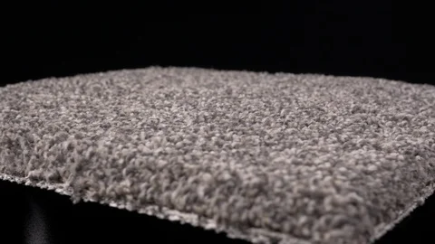 Thick dark gray carpet rotating medium closeup 4k Stockbeeldmateriaal 108010028