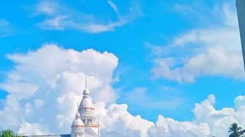 Thick Dramatic Clouds Over Countryside Village At Midday Stock Photos