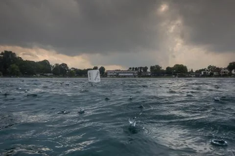 Thick drops in the rain at the lake while diving Stock Photos