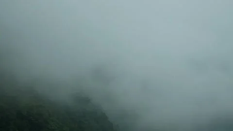Thick fog on the mountain slopes Stock Footage 278563202