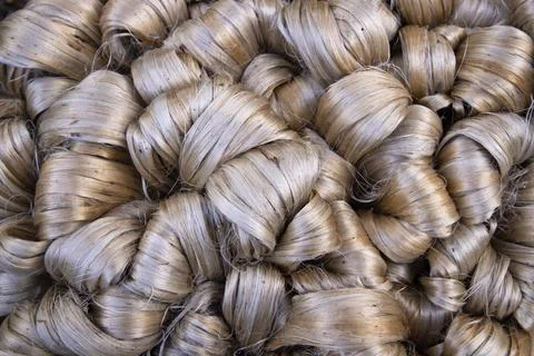 Thick Golden bundle of raw jute fiber Pattern Texture Stock Photos