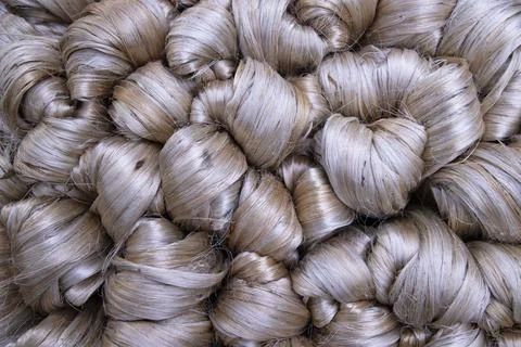 Thick Golden bundle of raw jute fiber Pattern Texture Stock Photos