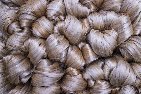 Thick Golden bundle of raw jute fiber Pattern Texture Stock Photos