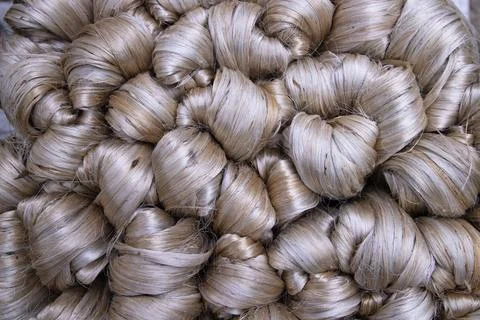 Thick Golden bundle of raw jute fiber Pattern Texture Stock Photos