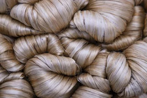 Thick Golden bundle of raw jute fiber Pattern Texture Can be used as a Back.. Stock Photos