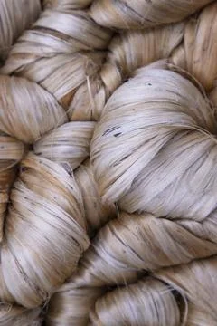 Thick Golden bundle of raw jute fiber Pattern Texture Stock Photos