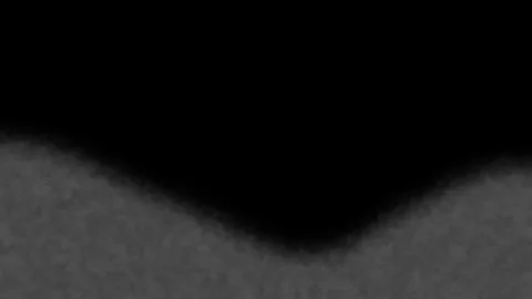 Thick Gray Smoke Rising from Below on Black Background Stock Footage 307043627